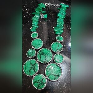 Sassy Jones Tizani Bib Green and Ring